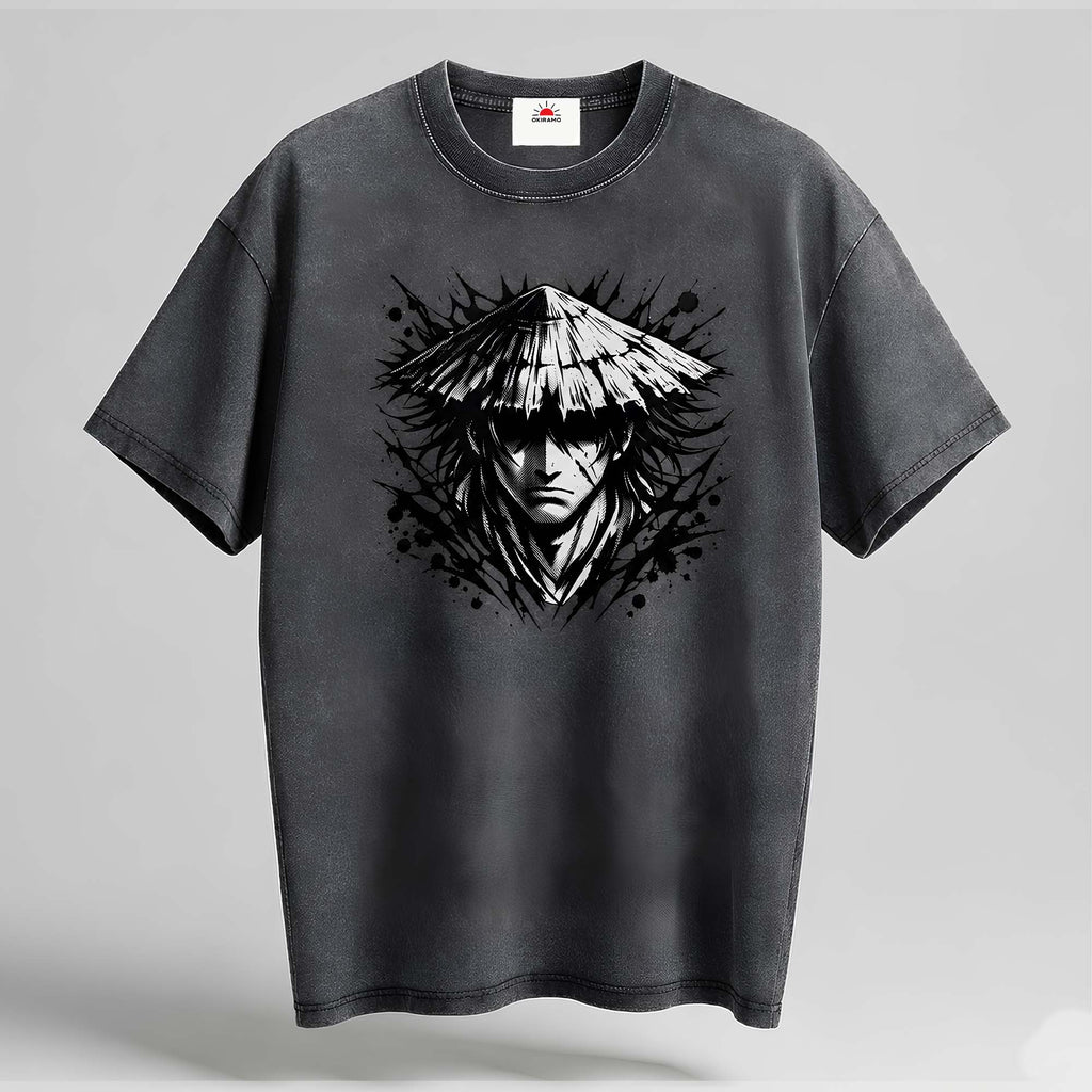 Black t-shirt with a graphic design of a person wearing a conical hat on a gray background